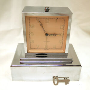 Bank and Alarm Mantel Clock, Nickle Plated, Key Wind, by Louis Schwab Switzerland. Designed for Winterthure Leben-Vie.