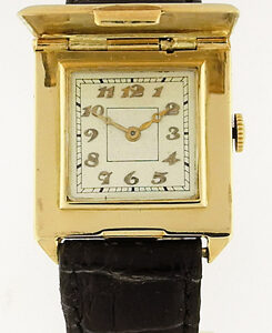 Hatot, Rare and Unique french 18K Yellow Gold Hunter case Wrist Watch .