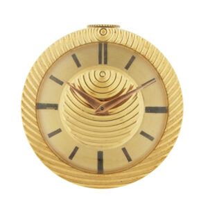 Universal Geneve 18k Yellow Gold Travel Clock, With stylized fluted dial & bezel c. 1950. w/ fitted leather case