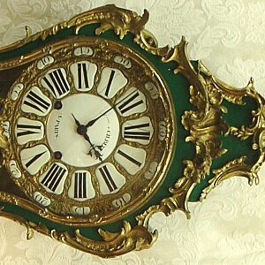 Franncois Gilbert A French Gilt Brass Table Clock
